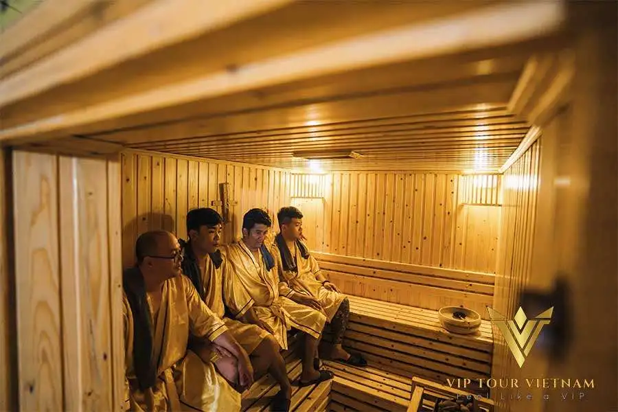 Traditional wooden sauna - the best way to relax your body before a nuru session.